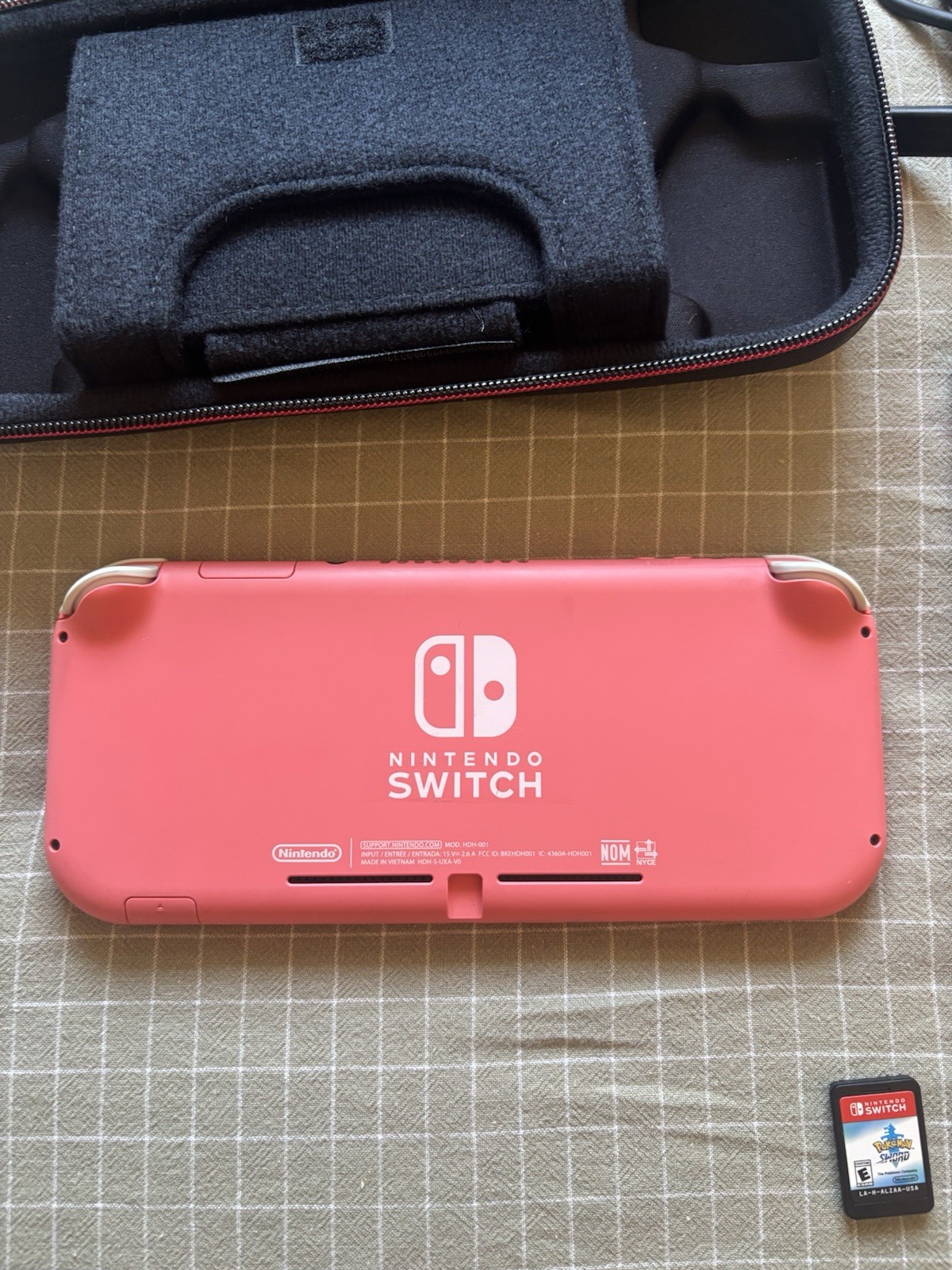 Nintendo Switch Lite Coral 32gb Bundle With Case 2 Games