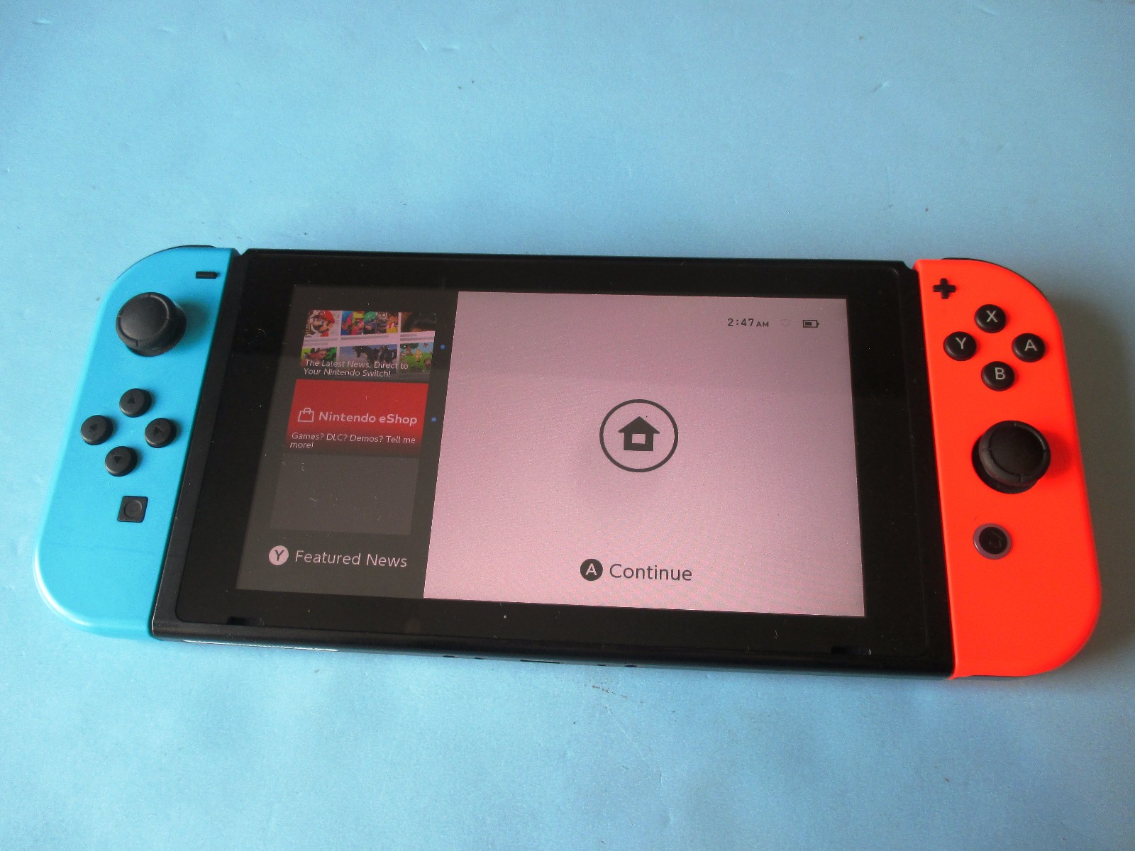 Nintendo Switch System Console w/Neon Red & Blue Joy-Cons + Dock & Extras