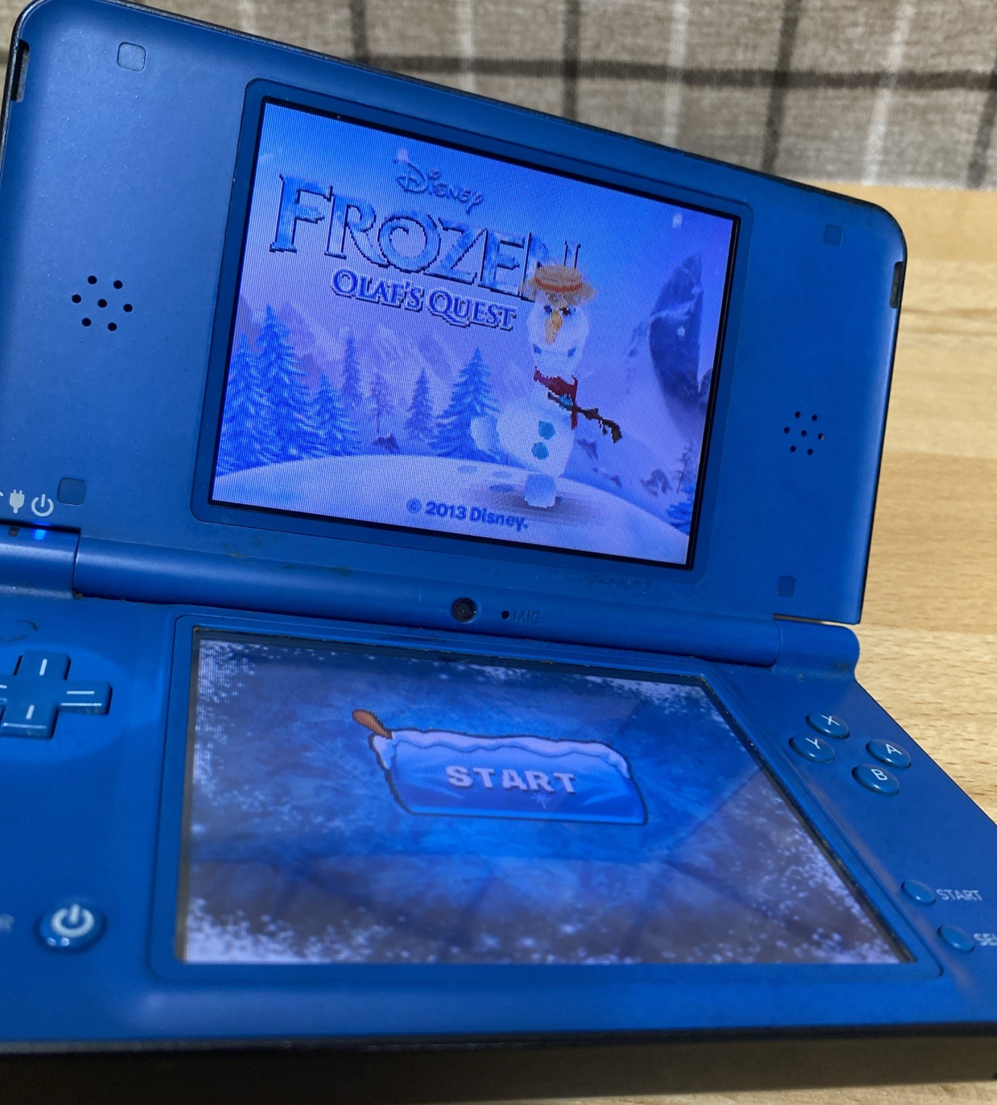 Nintendo DSi XL Handheld System – Midnight Blue With Charger And Frozen Game
