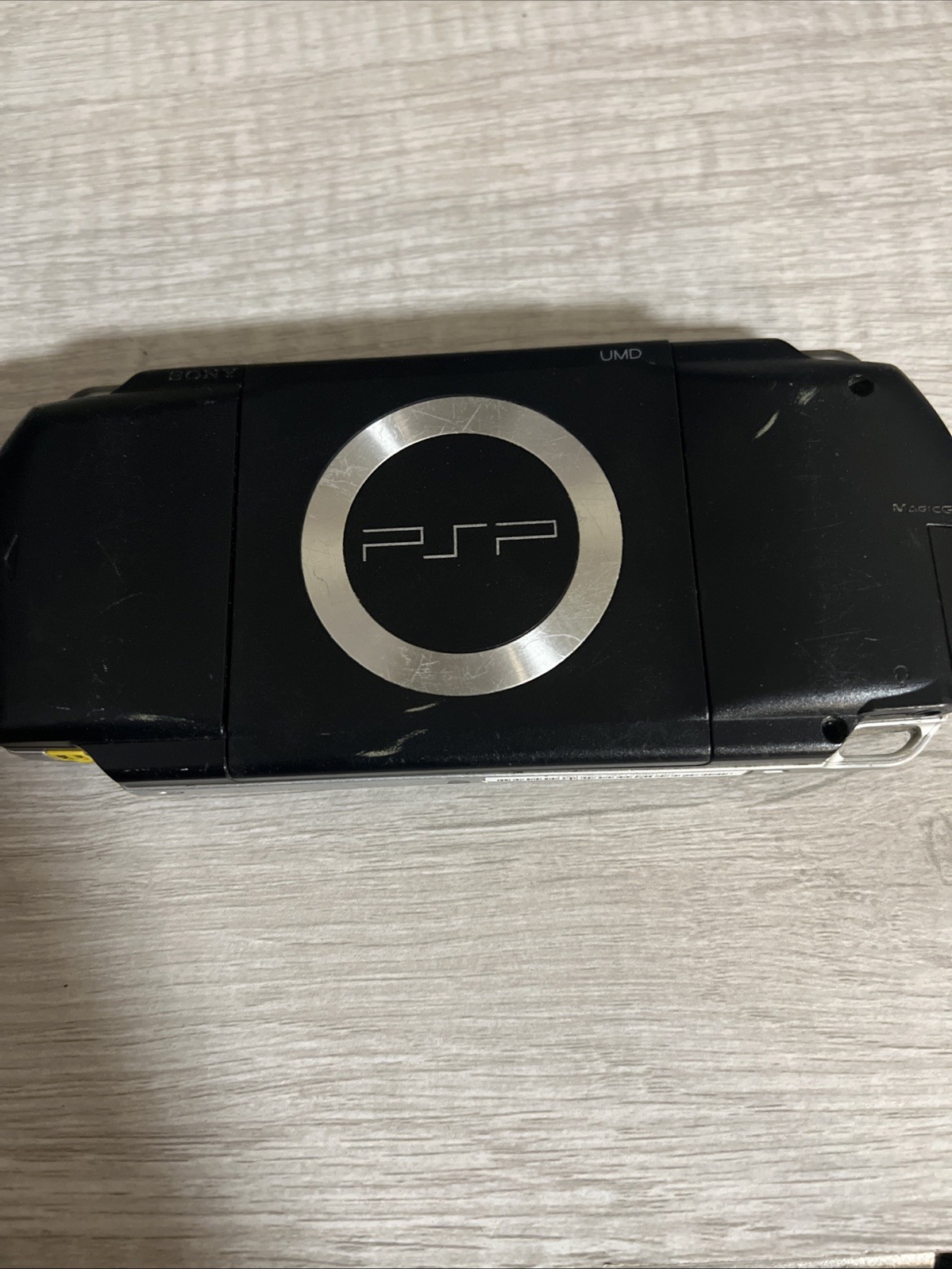 psp with battery and sd card , socom game, no power cord