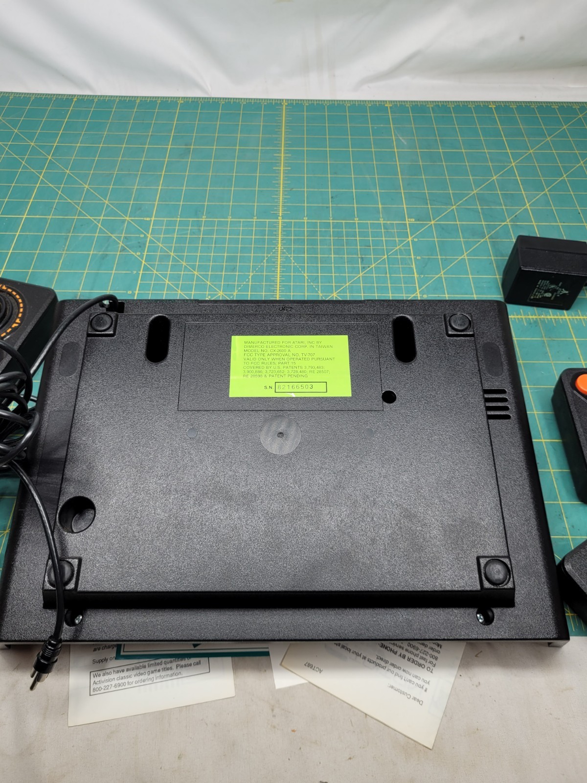 Atari 2600 console With Cords And 4 Joystick Controllers Powers On Needs Work