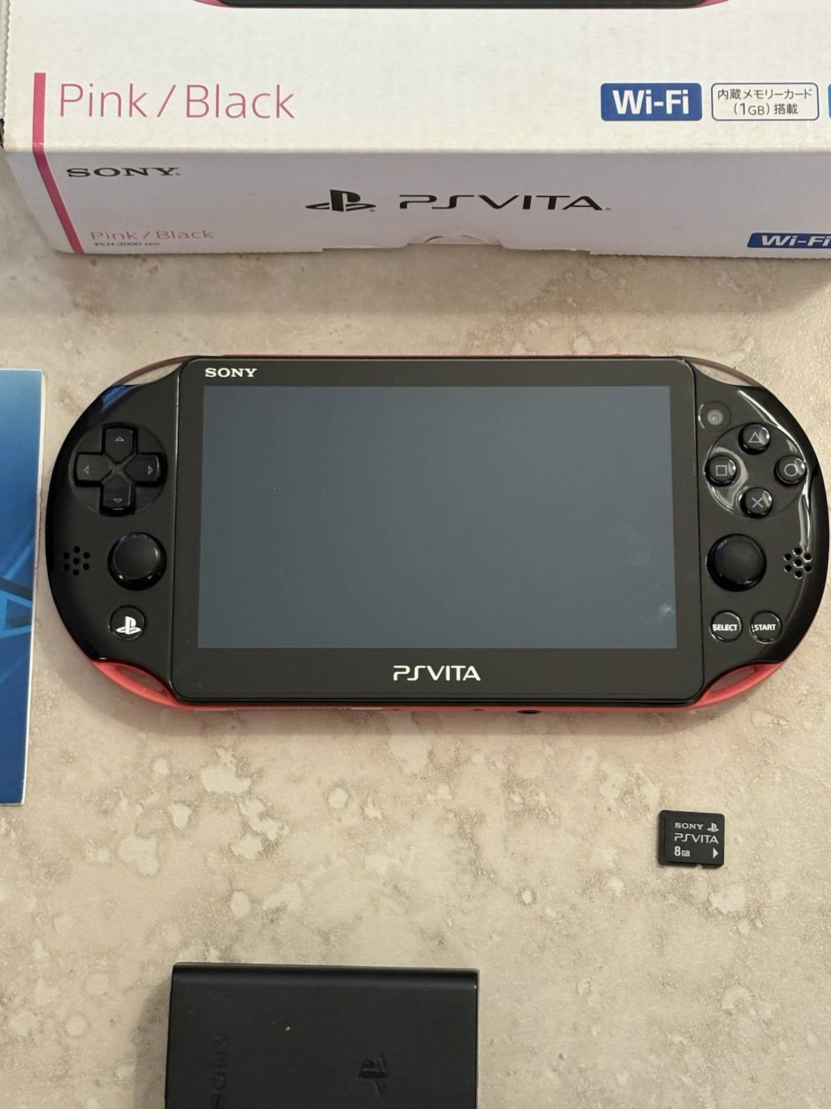 Sony PS Vita PCH-2000 Complete In Box – Pink and Black 8GB Very Good Condition