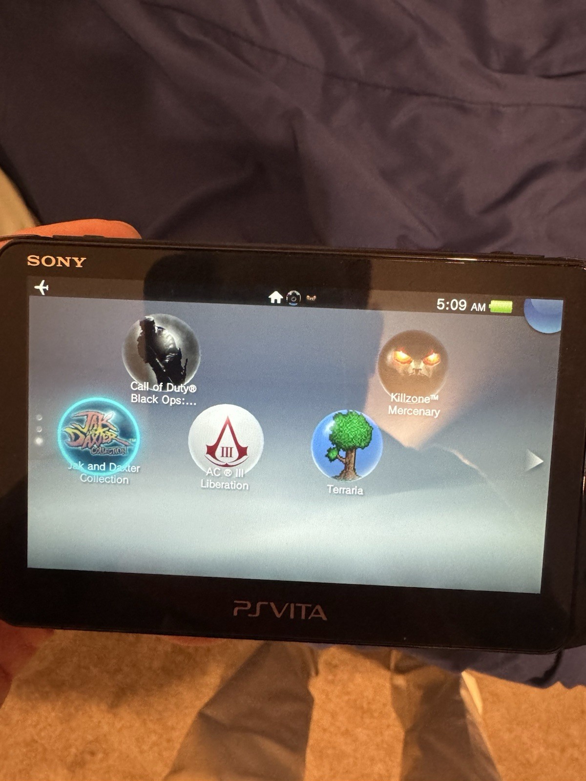 Sony PS Vita Slim (PCH-2001 with 4 Games Case and Charger Included)