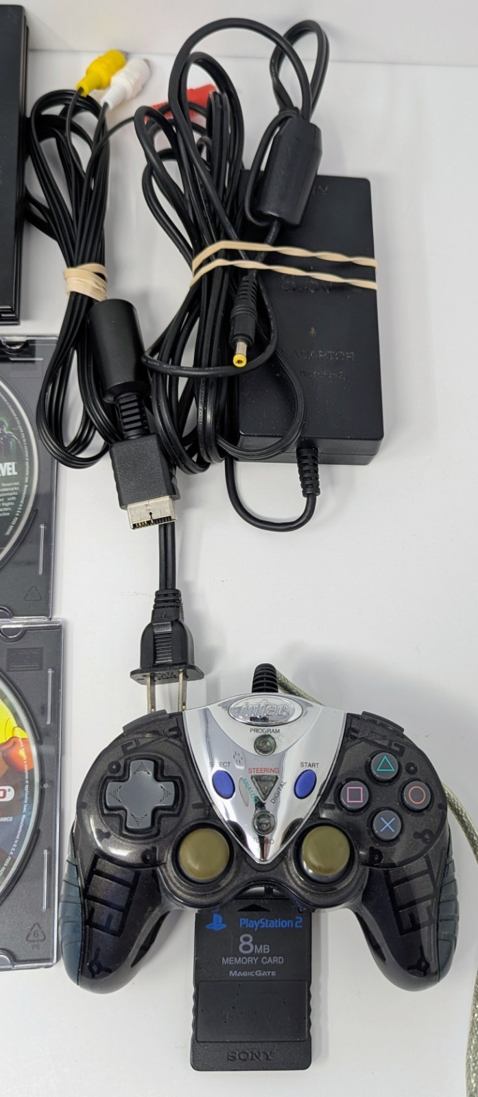 Sony PlayStation 2 PS2 Slim Console Bundle w/ 10 Games – Tekken 4, Sims, & More!