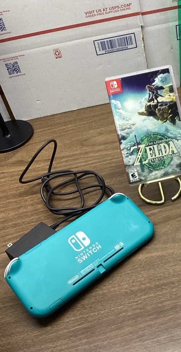 Nintendo Switch Lite Turquoise Teal Handheld Console Bundle with Zelda Game