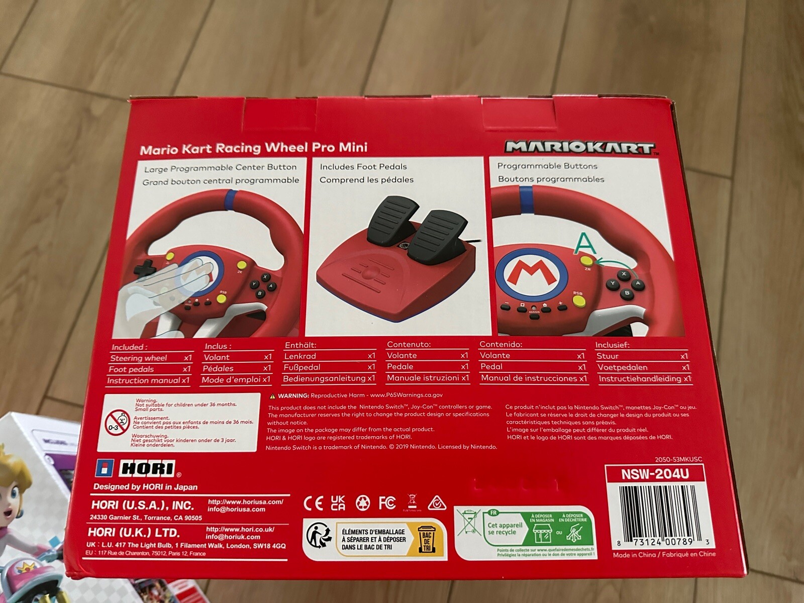 Nintendo Switch Mario Kart 8 Console Bundle with Hori Steering Wheel
