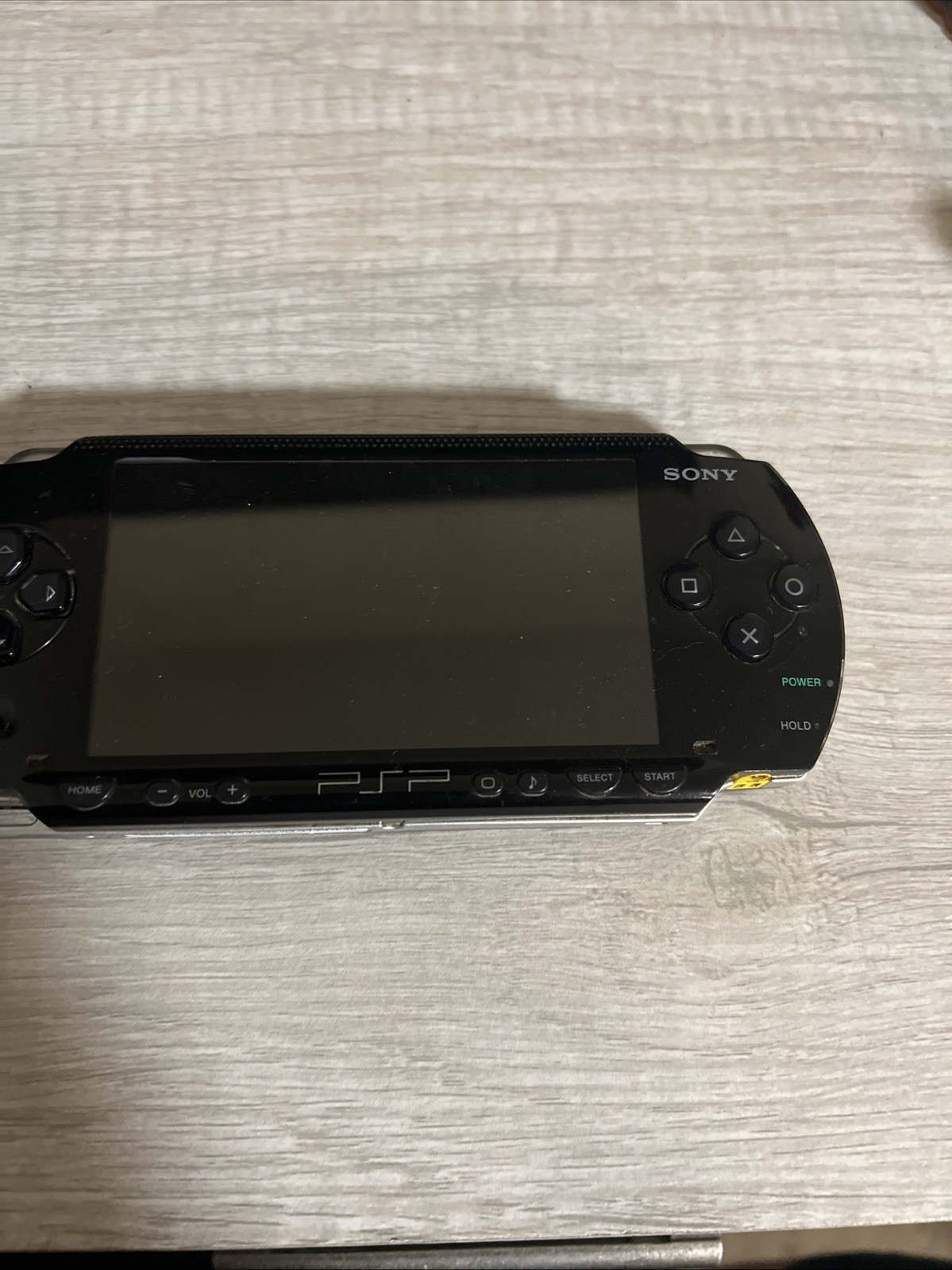 psp with battery and sd card , socom game, no power cord