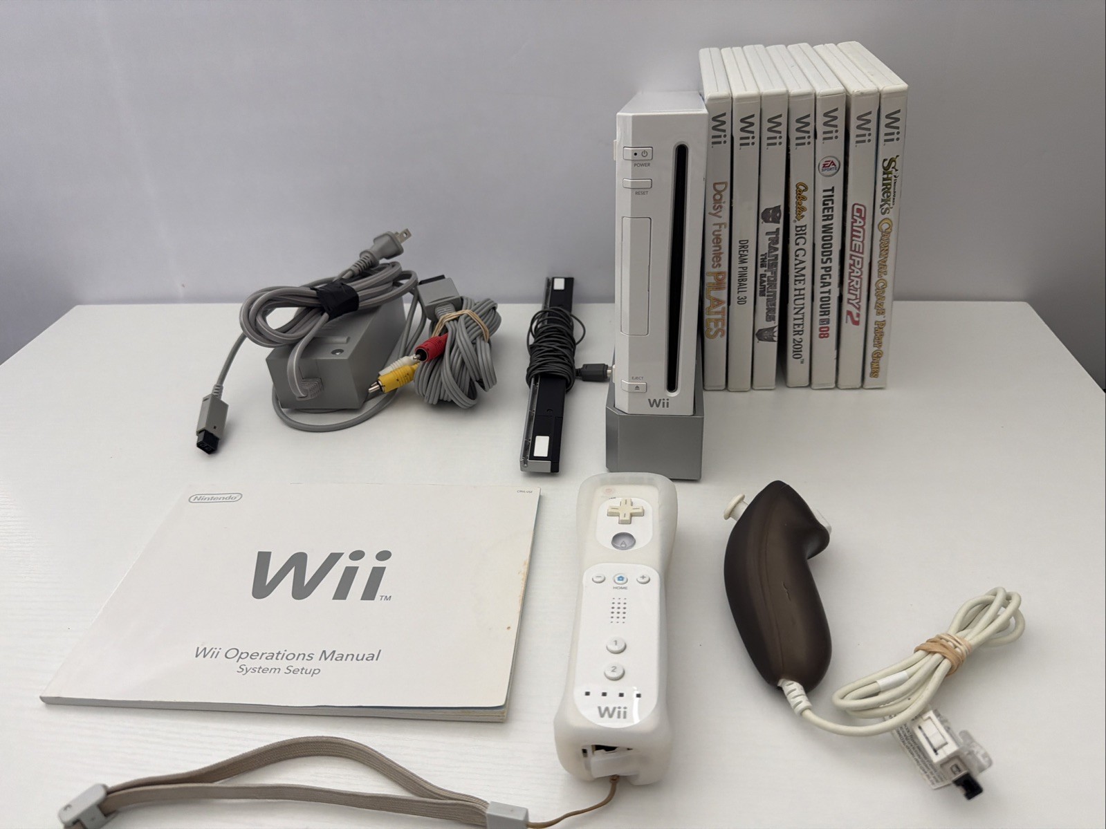 Wii Console Bundle Tested with 7 Games, 1 Controller, and 1 Nunchuck + Cables
