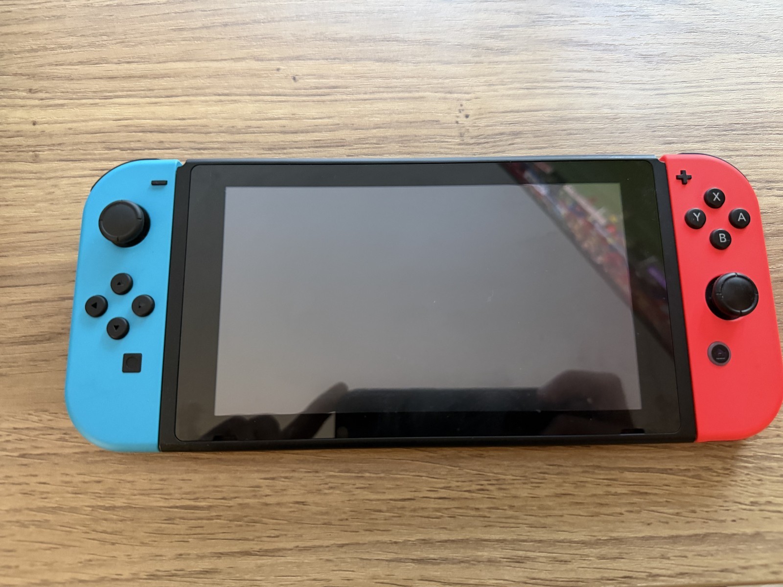 Nintendo Switch 32GB Handheld Console – Neon Red/Neon Blue
