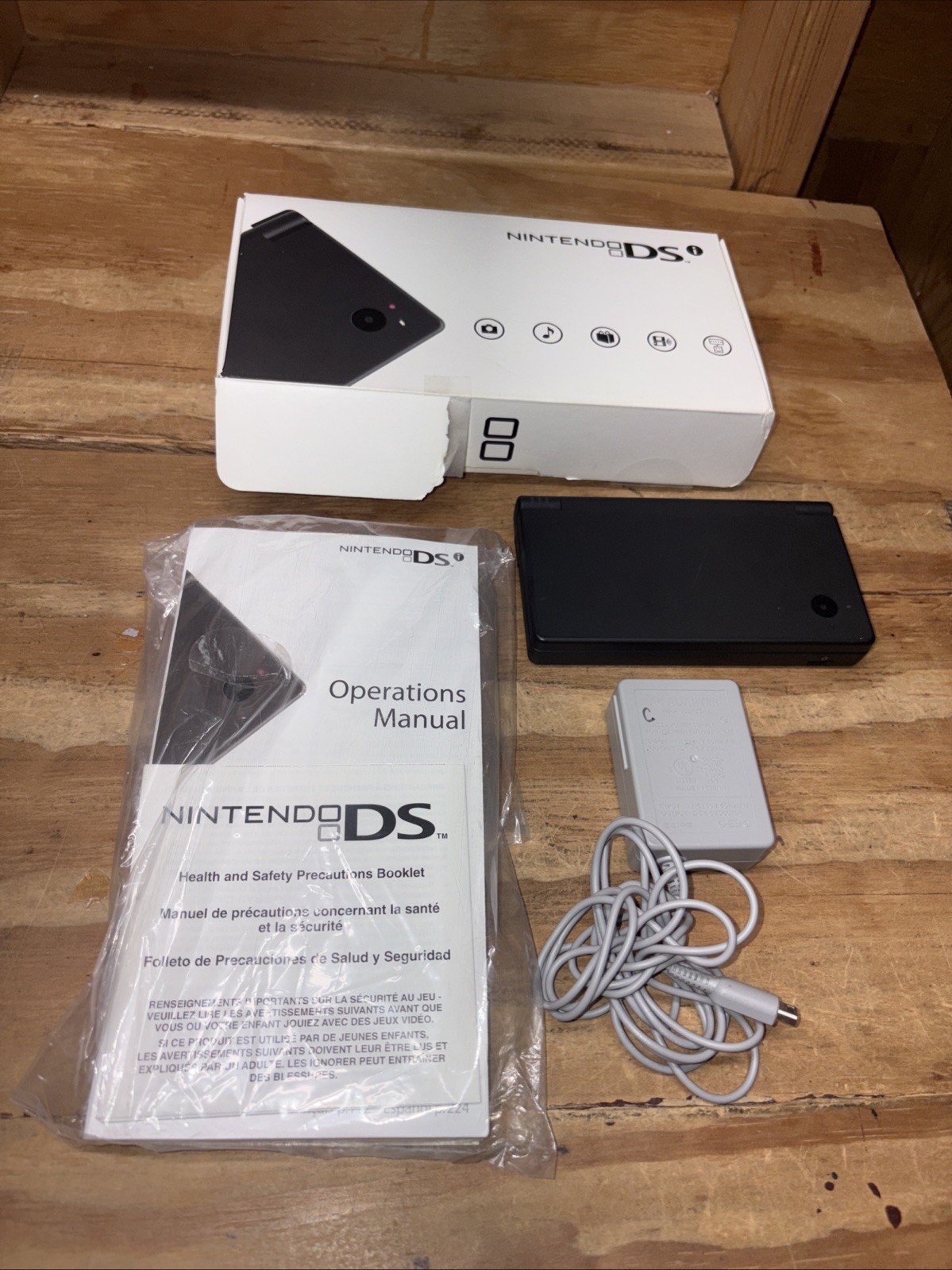 Nintendo DSi Black Handheld System in Box with Charger and Replacement Stylus