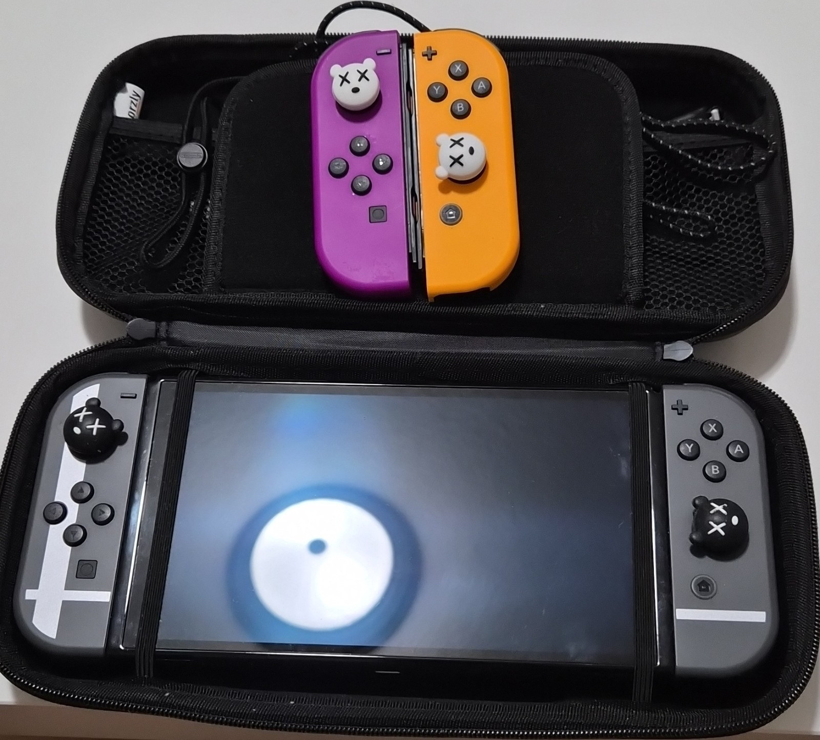 Nintendo Switch Black/Gray Console with Purple and Orange Joy-Con Controllers