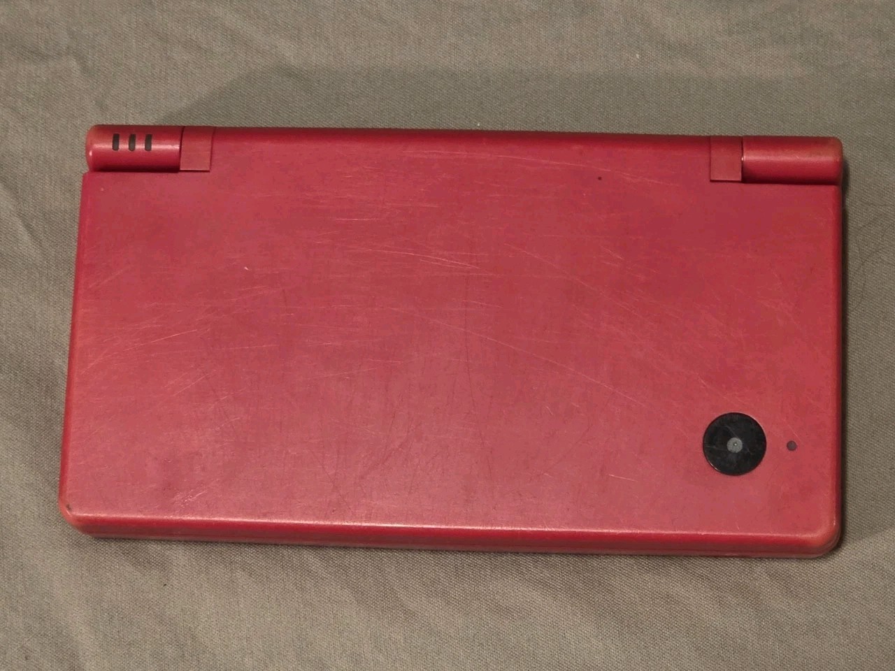 Nintendo DSi Red Handheld Gaming Console (Stylus And Charger Included)