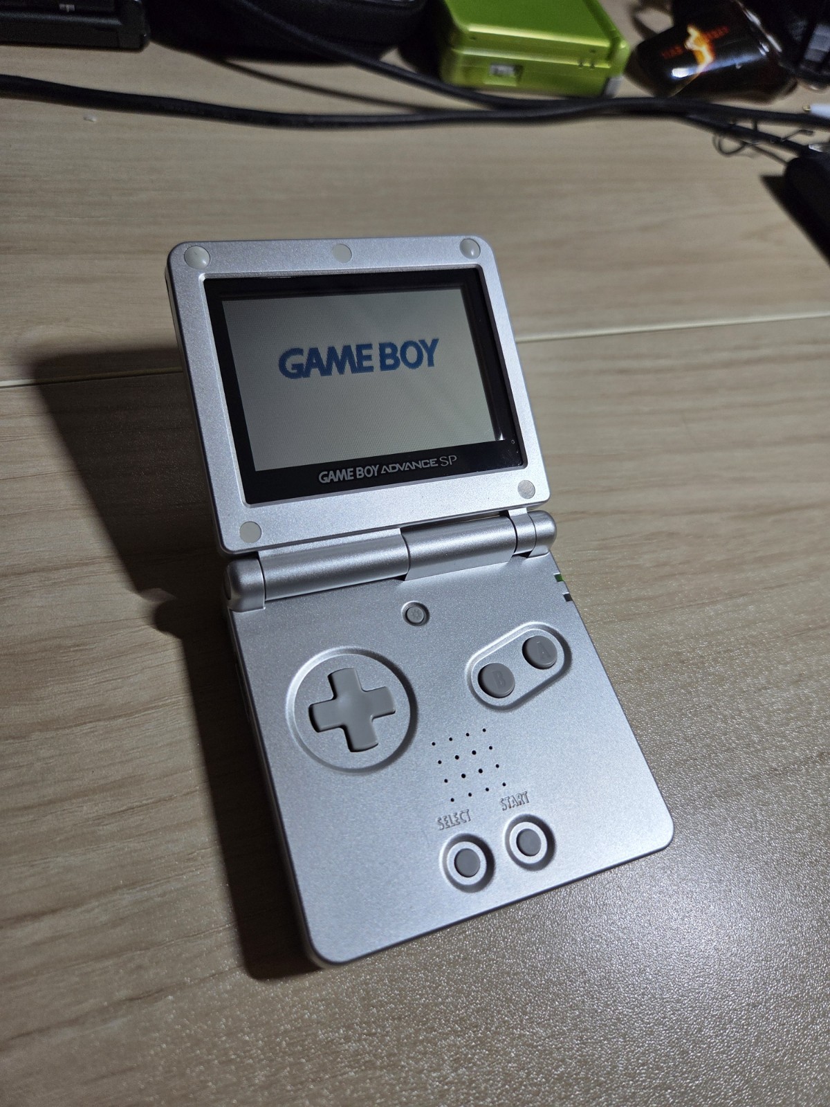 Platinum Nintendo Game Boy Advance SP (AGS-001) CIB with Pokémon Leaf Green