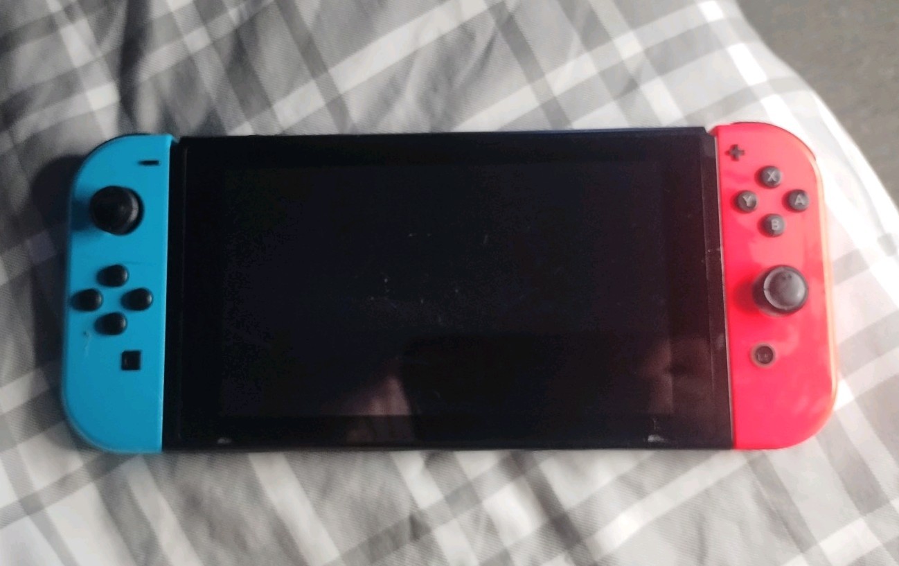 Nintendo Switch Console 32GB 720p Wi-Fi USB-C w/ Neon Red/Blue Joy-Con