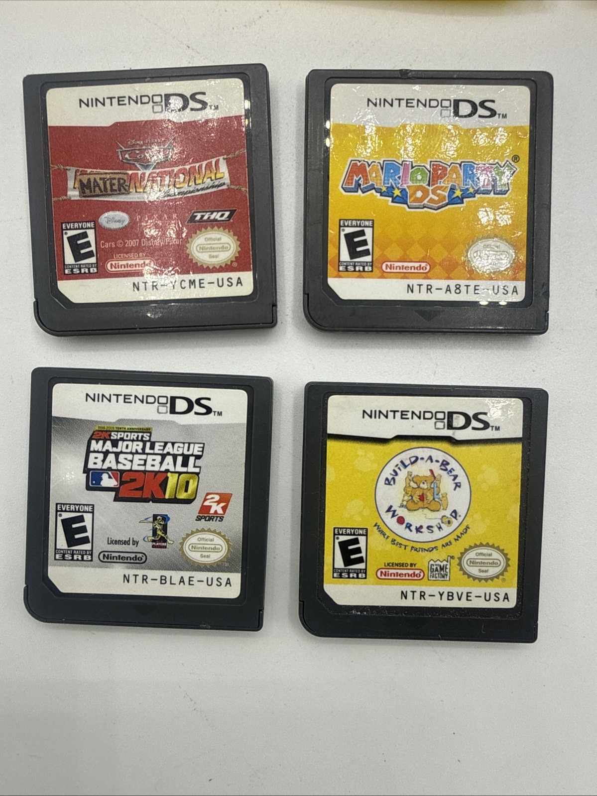 Nintendo DSI XL Handheld Console Bronze UTL-001 Bundle 8 Games, Charger, Stylus