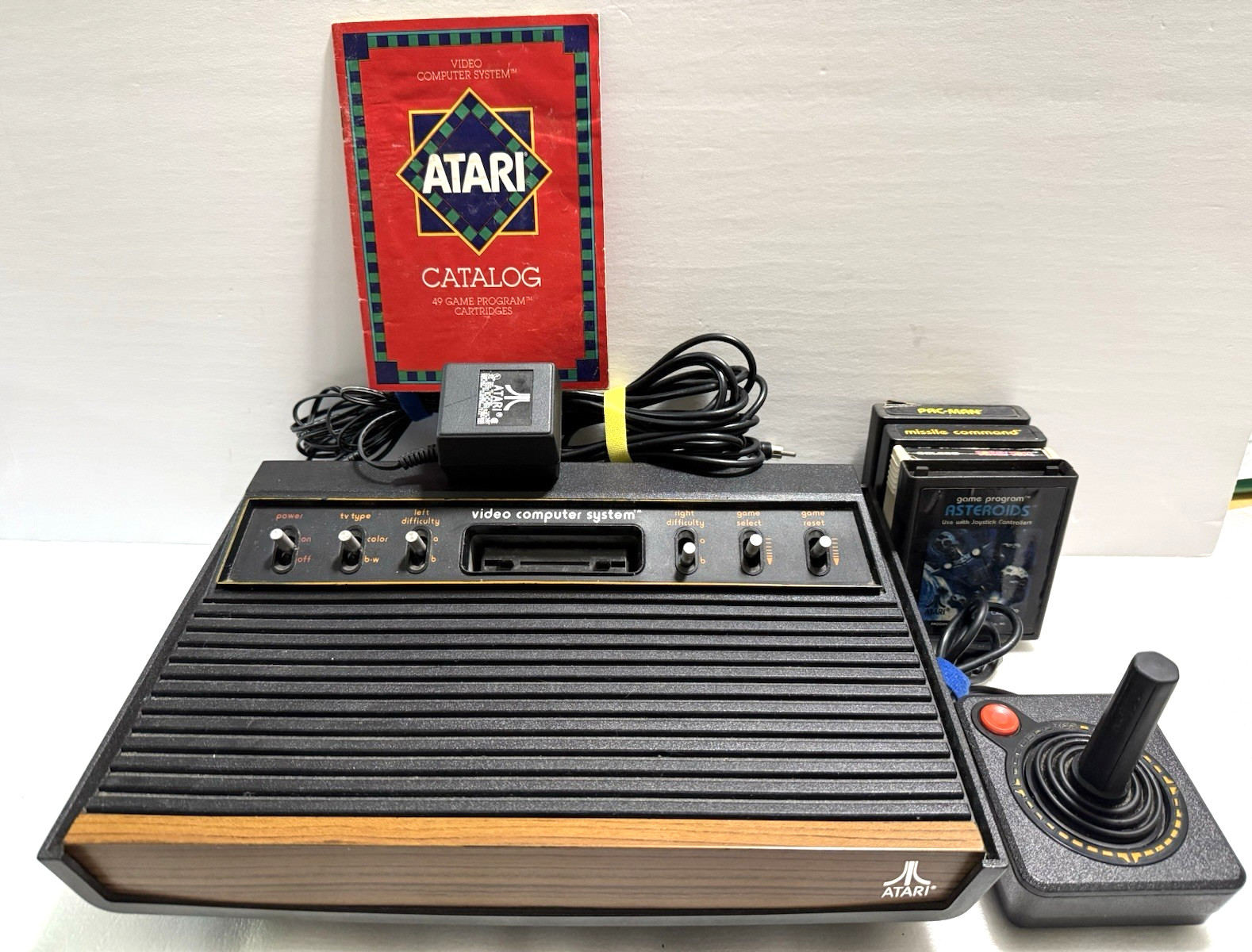 Atari 2600 Console Bundle Power Supply, Controller, 4 Games, Catalog