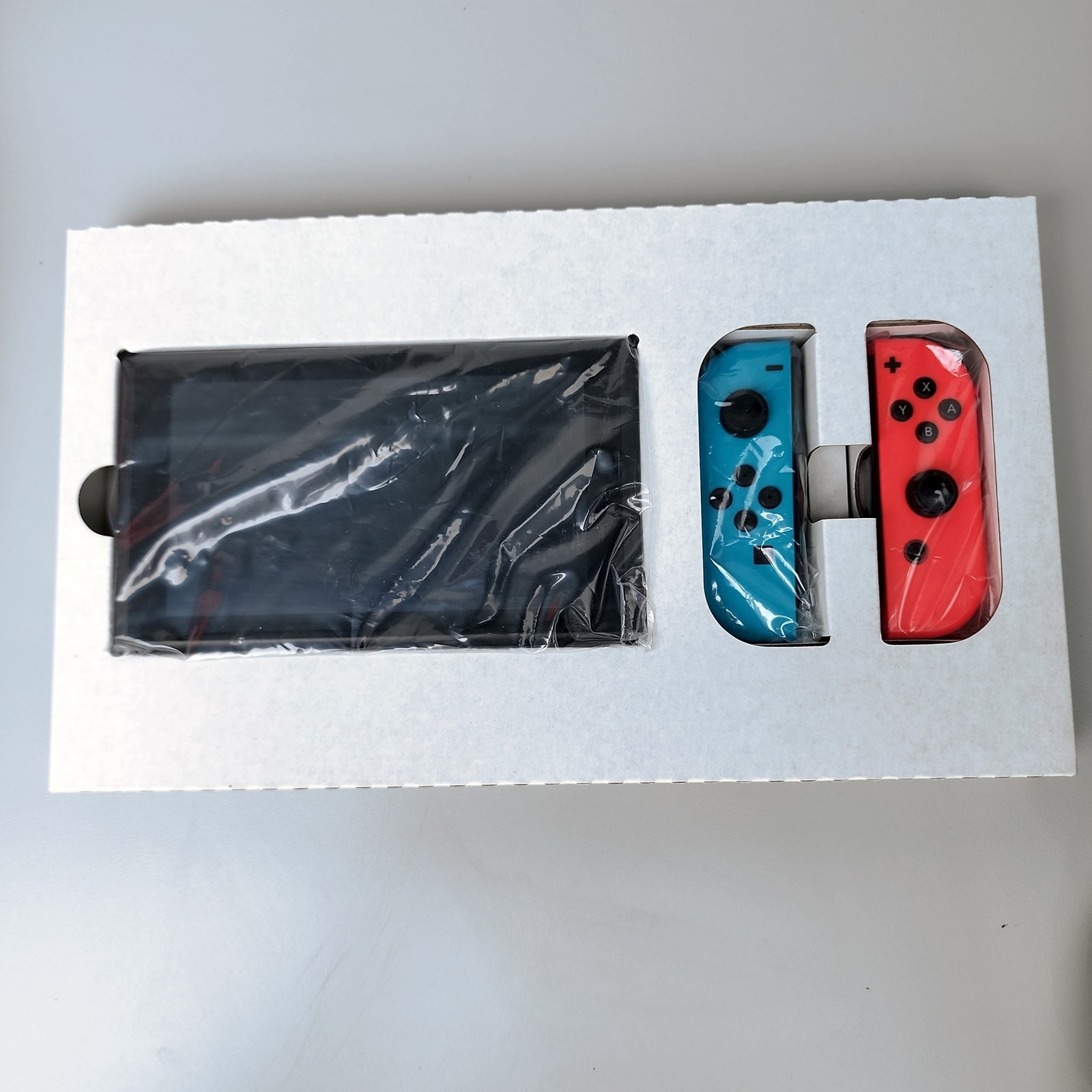 Nintendo Switch HAC-001 32GB Neon Red/Blue Joy-Con Console NEW/opened in Box
