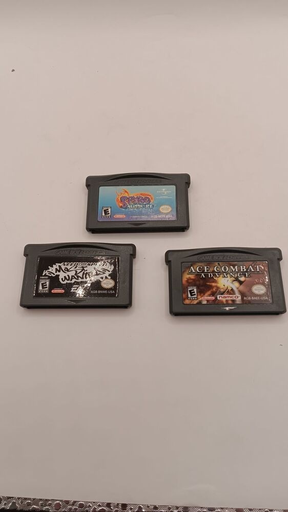 NINTENDO AGB-001 GAMEBOY ADVANCE WITH CASE AND THREE GAMES
