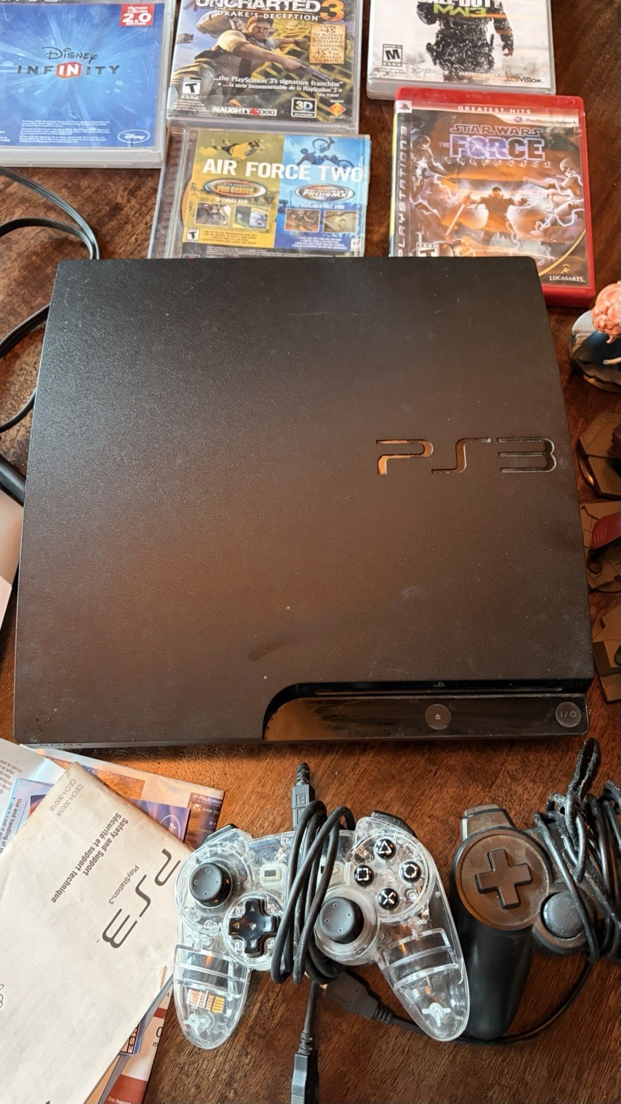 Sony PS3 Slim 320GB CECH-3001B Bundle 5 Games Two Controllers