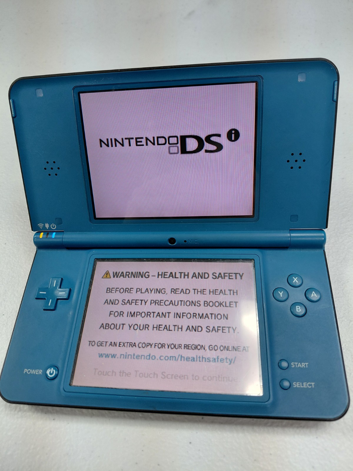 Nintendo DSi XL Blue Handheld System w/ Carrying Case & Yellow Stylus