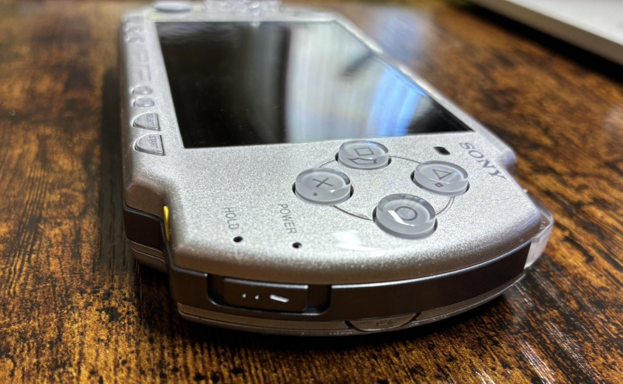 Sony PSP-2001 Silver Console NEW-Barely Used w/New Battery/Charger + 3 UMDs
