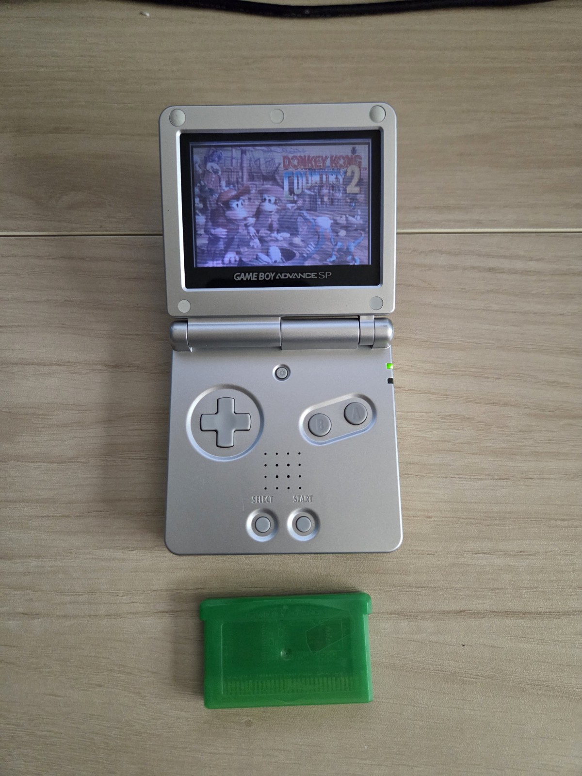 Platinum Nintendo Game Boy Advance SP (AGS-001) CIB with Pokémon Leaf Green