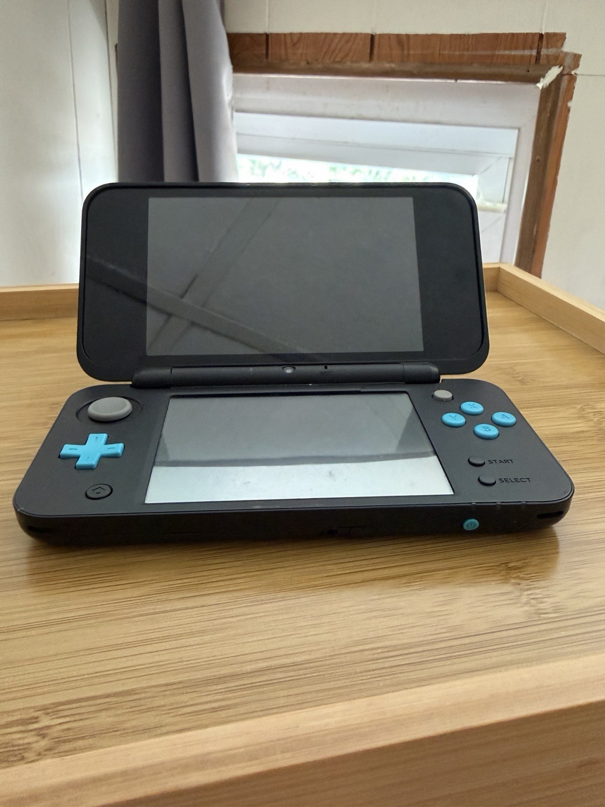 Nintendo New 2DS XL Handheld Console Black/Blue 4GB Wi-Fi NTSC-U/C (US/CA)