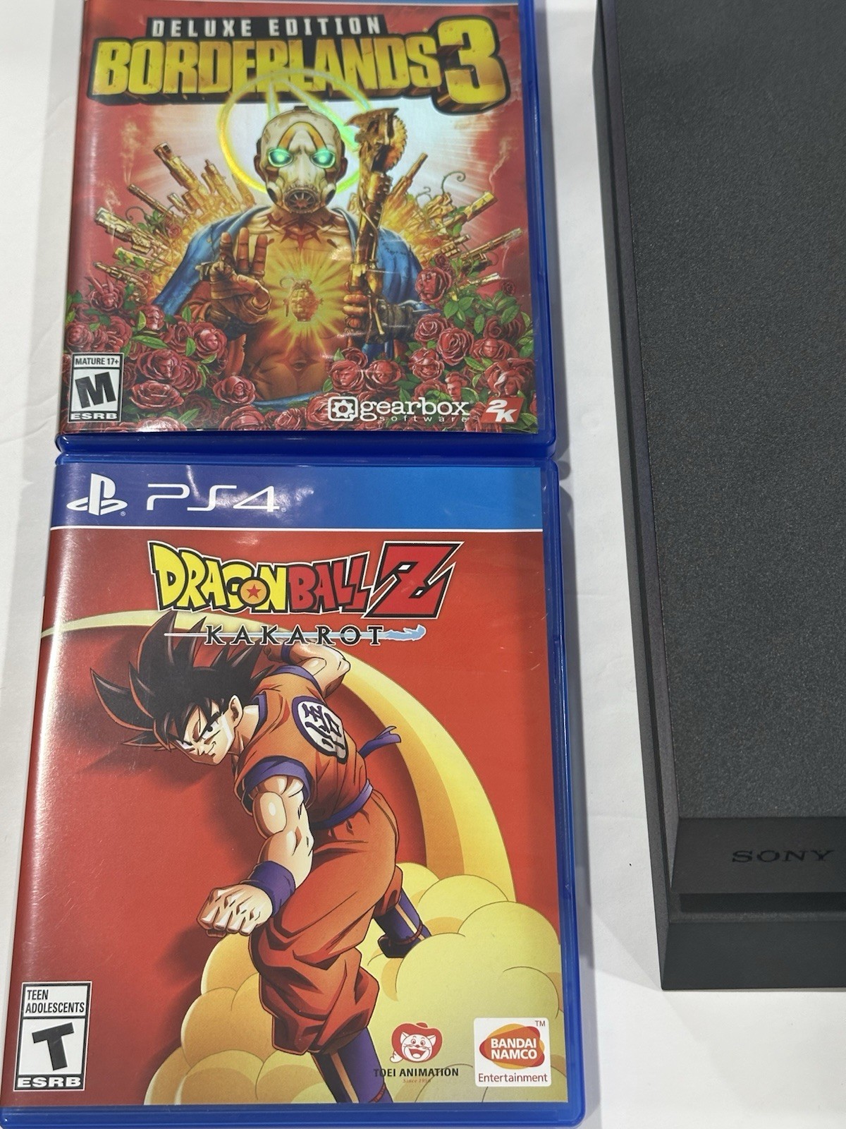 Playstation Four Lot ( PS4 Factory Reset & 4 Games Included) with controller