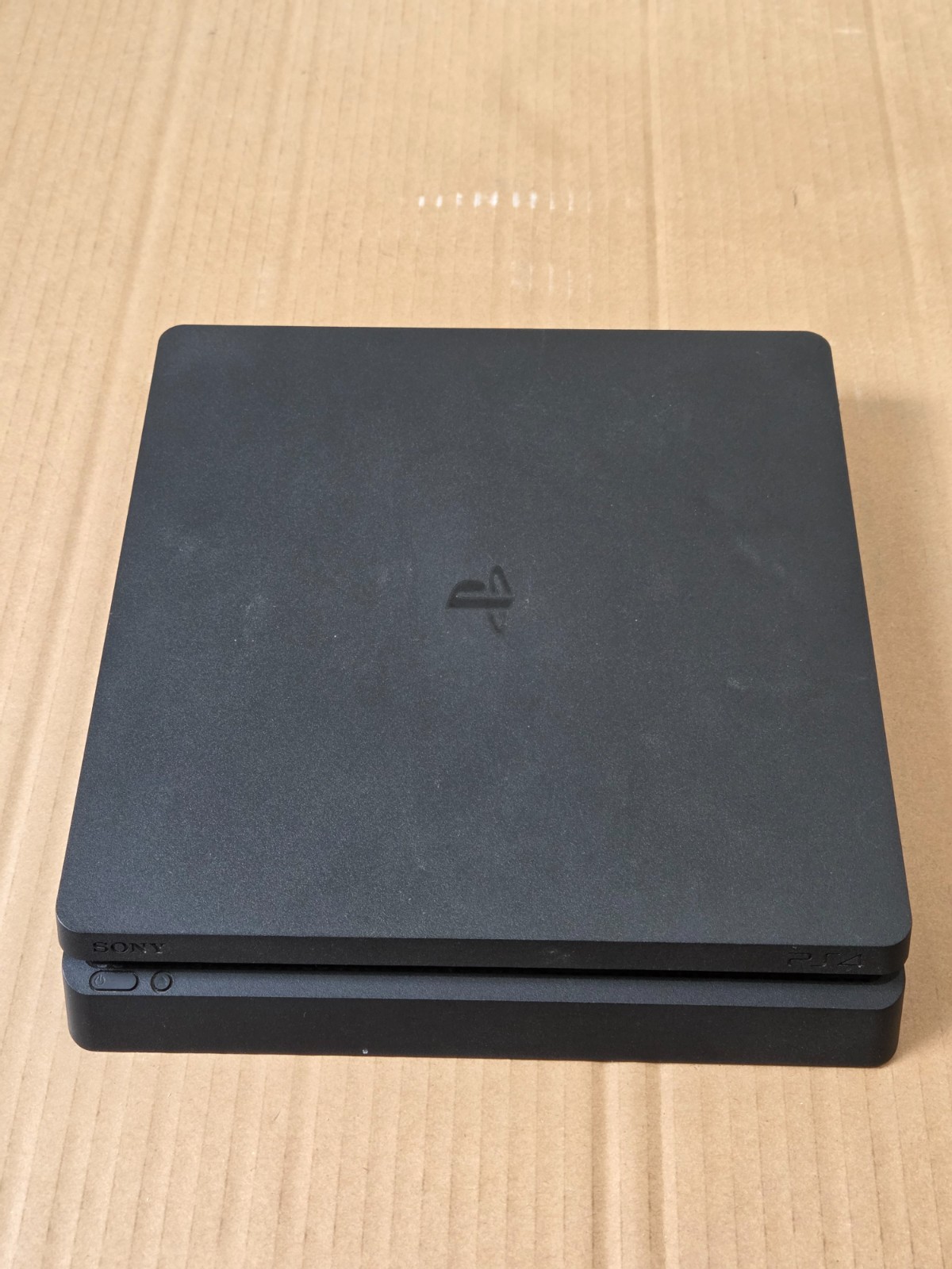 Sony PlayStation 4 Bundle 1TB HDD, 2 Controllers, Charging Mount, Games, and 25$