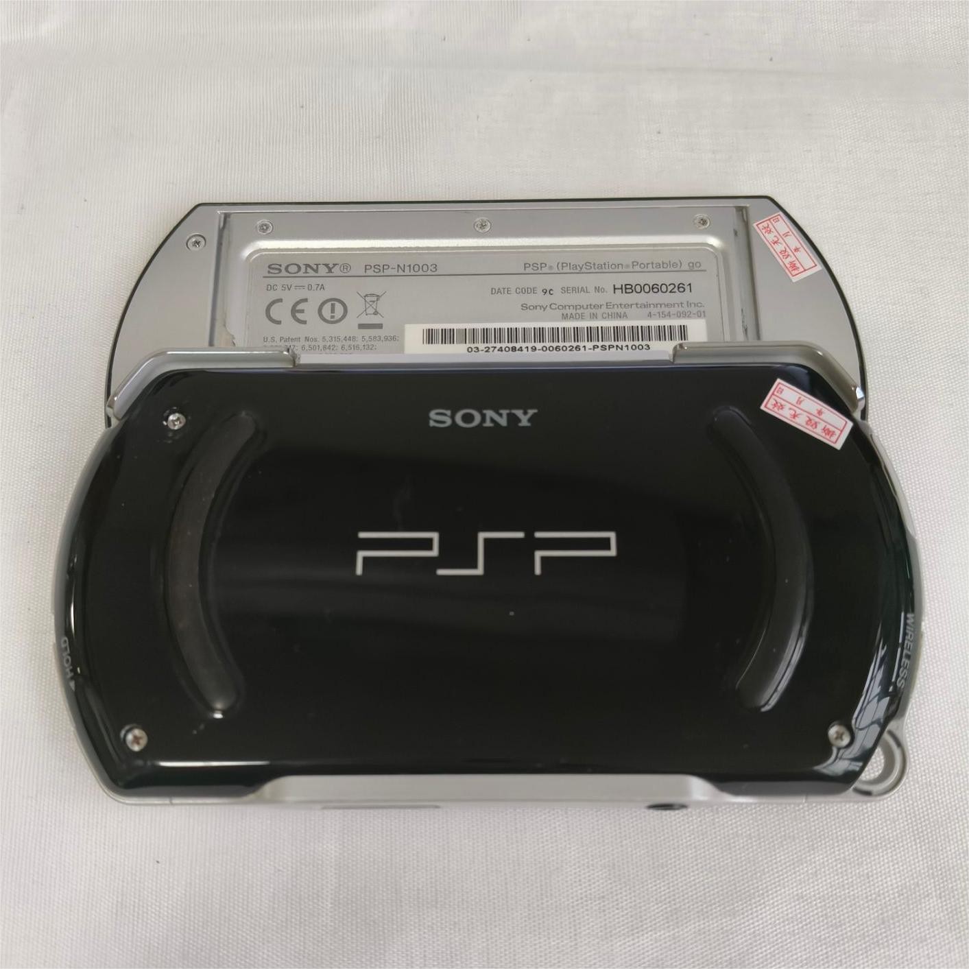 Sony PSP GO console Black with Charger PSP-N1003 Screen with protect