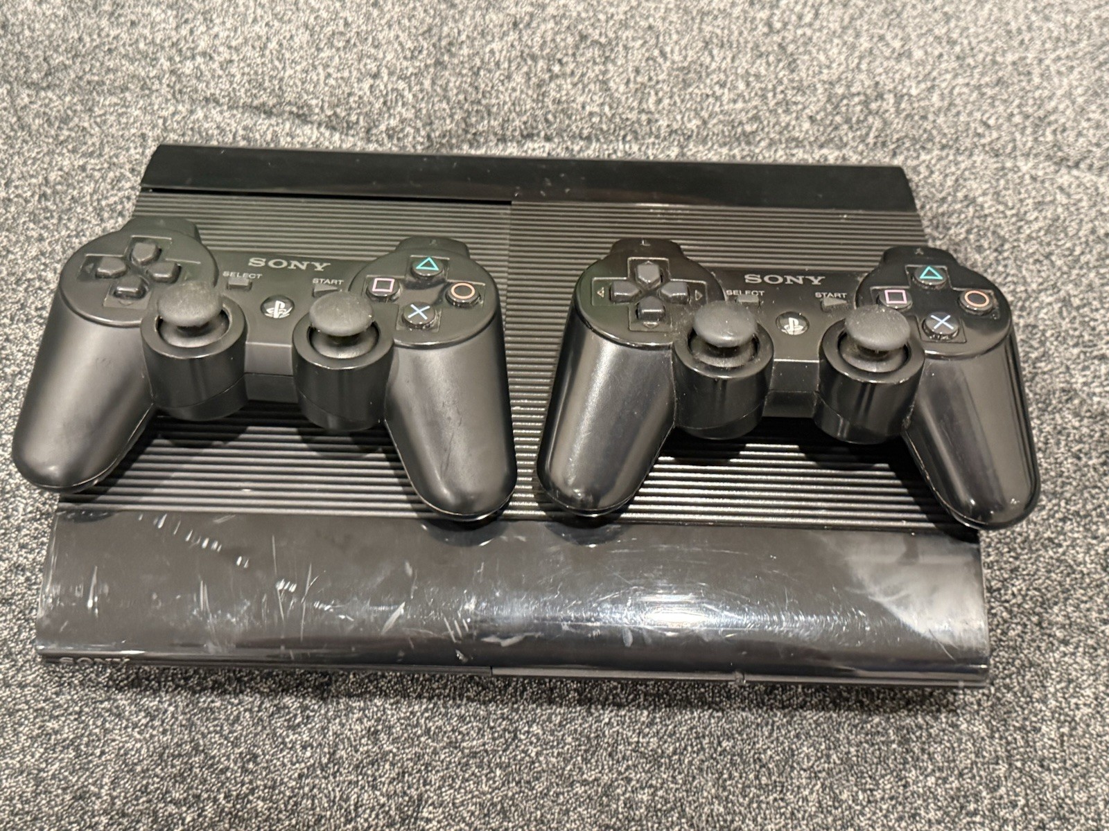 Sony PlayStation 3 PS3 Super Slim CECH 4201A 12GB Console And 2 Remotes No Cords