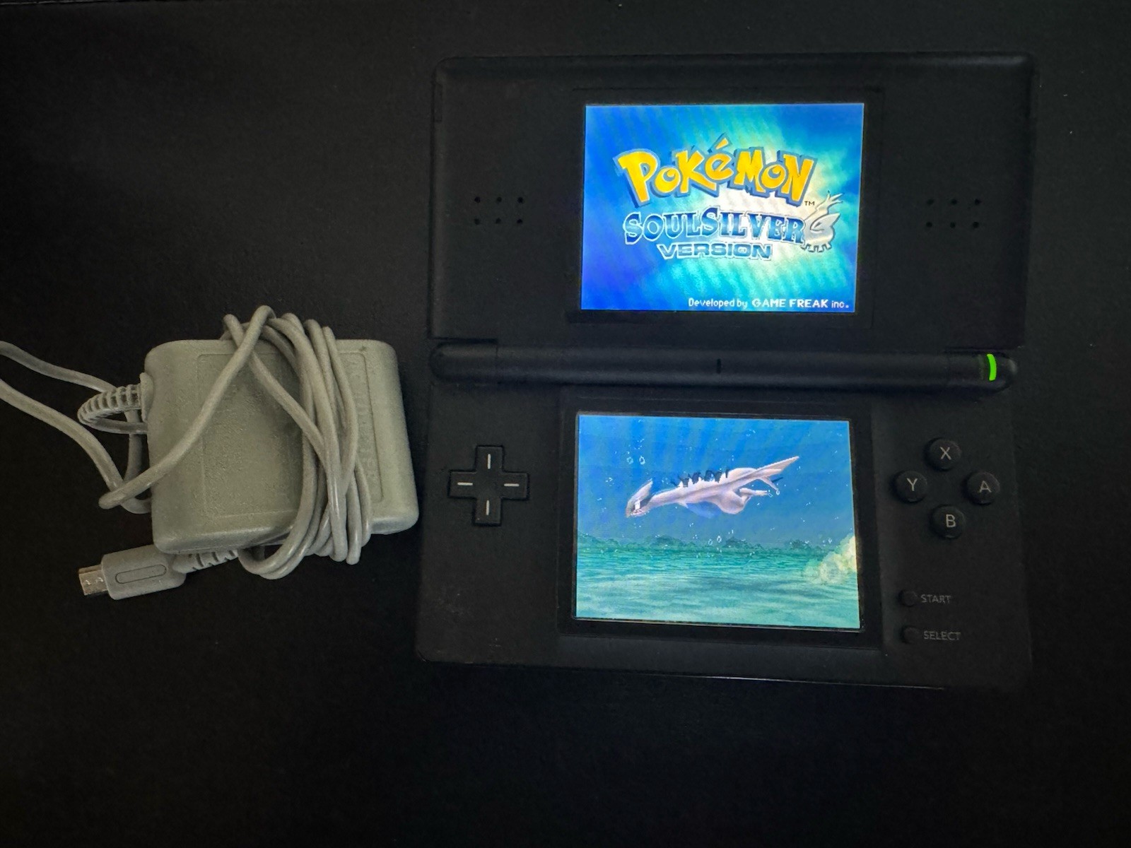 Nintendo DS Lite Handheld System – Black w/Stylus, Charger, & Pokemon SoulSilver