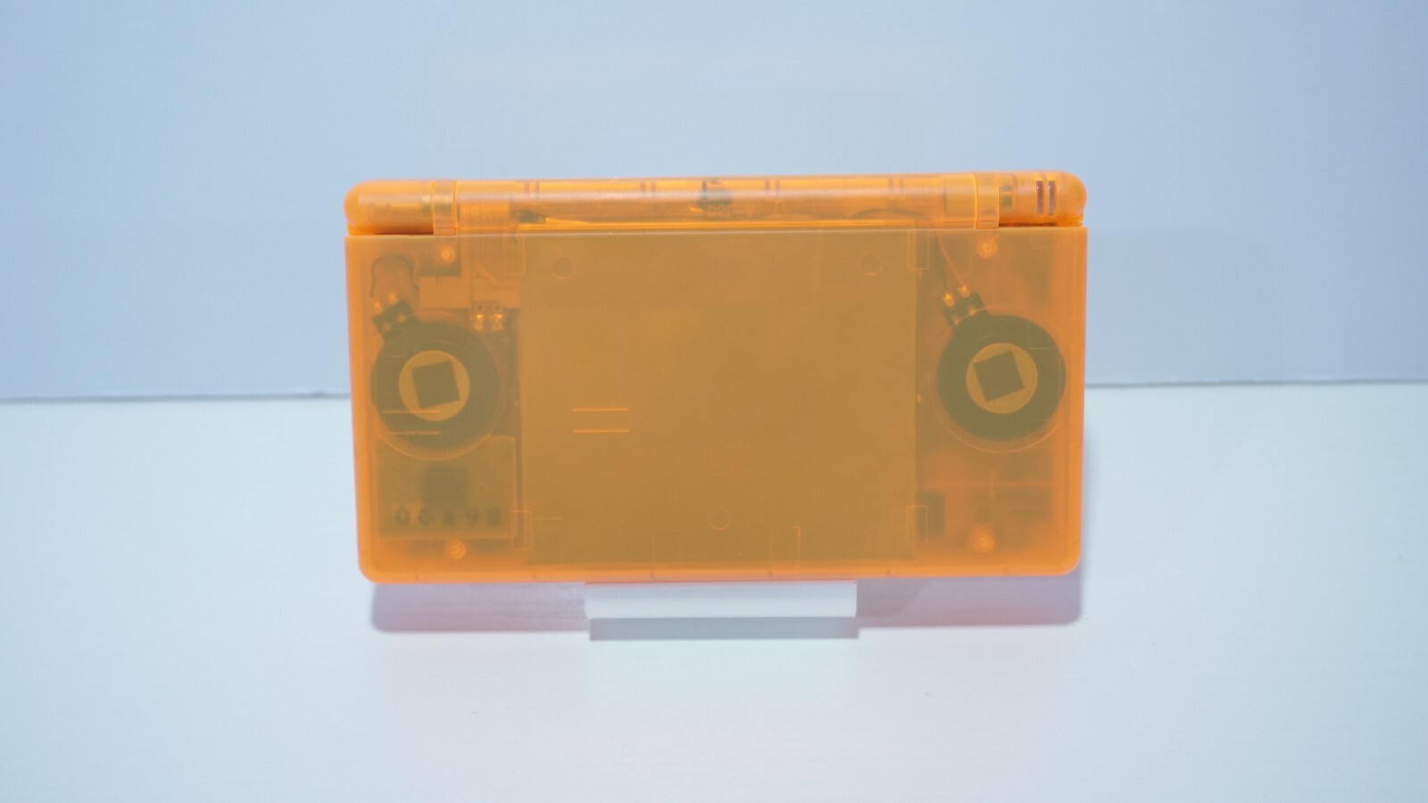 Nintendo DS Lite Transparent Clear Orange Handheld System with Charger & Stylus