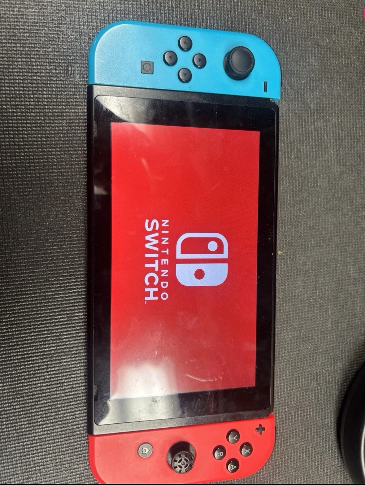 Nintendo Switch HAC-001(-01) 32GB 720p w/ Neon Blue/Red Joy-Con & Grip