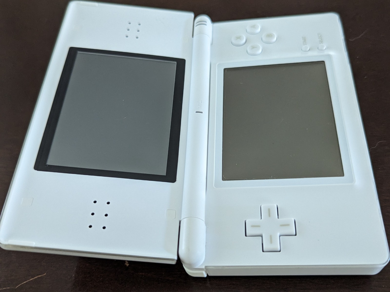 Nintendo DS Lite with Charger, Hard Case, soft case, 15 games in cases.