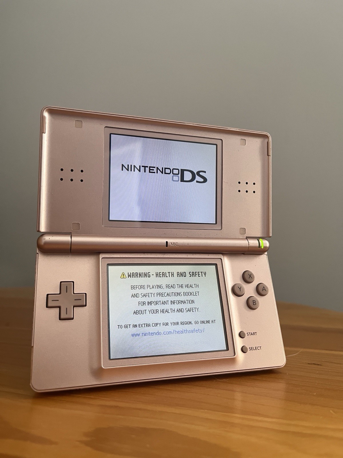 Nintendo DS Lite Metallic Rose Gold Handheld Console Only