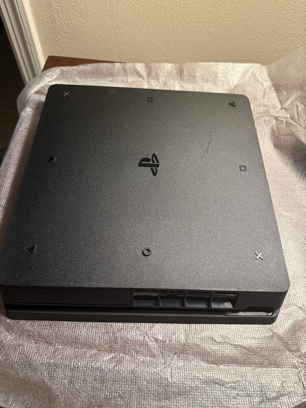 Sony PlayStation 4 Slim Jet Black, 500GB with 2 controllers (1 older model).