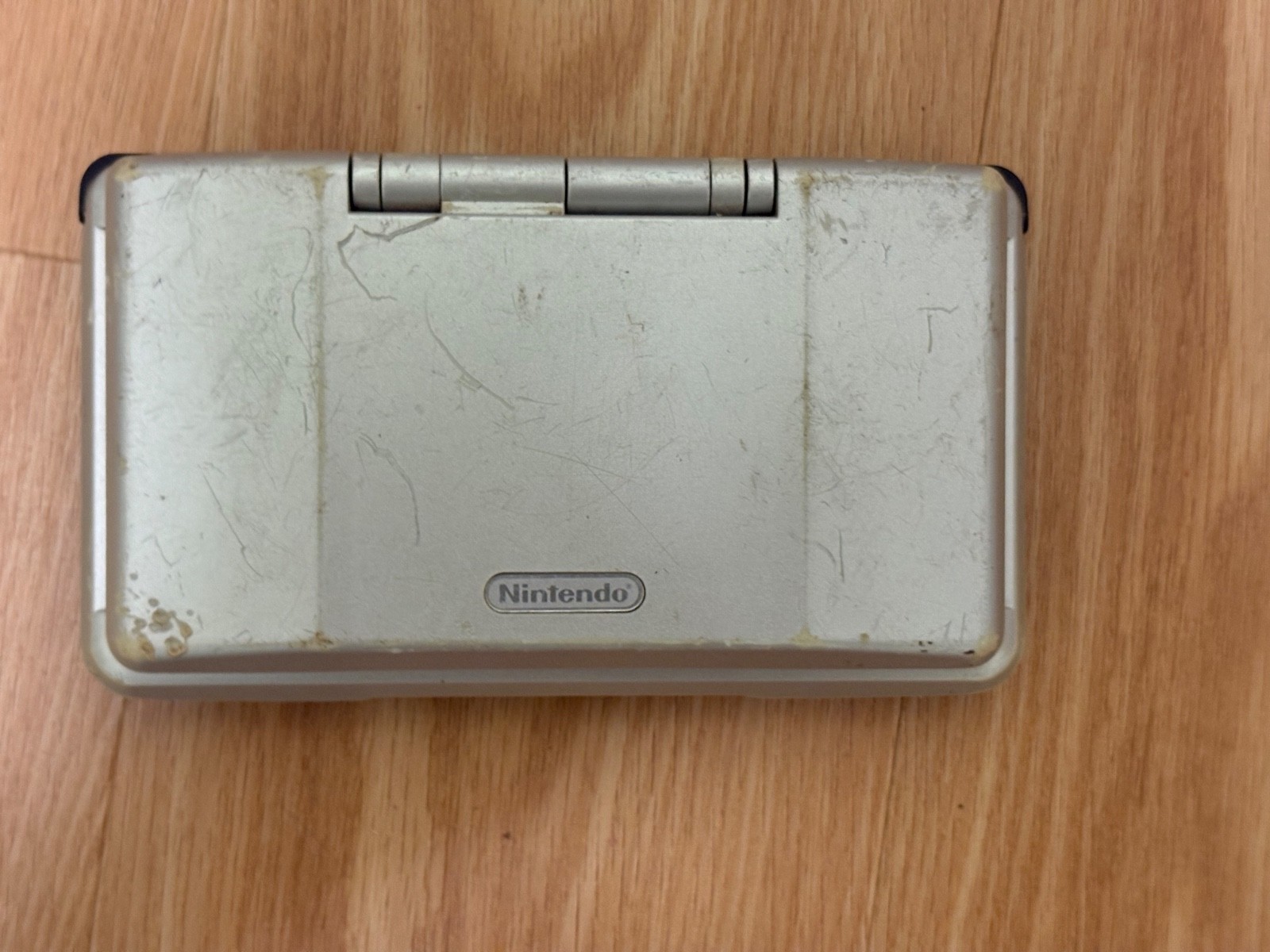 Nintendo DS Silver Handheld System – Fair Condition – TESTED AND WORKING! (2A)