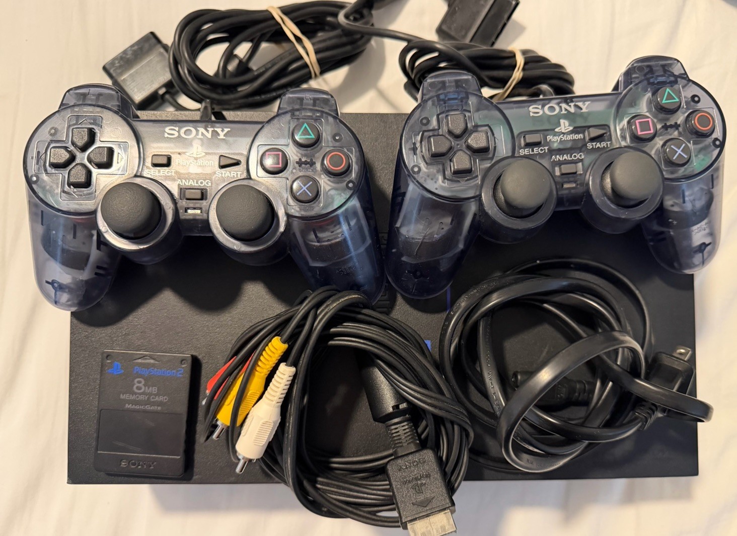 Sony PlayStation 2 Console – Black (SCPH-30001) With 6 Games, 2 Controllers