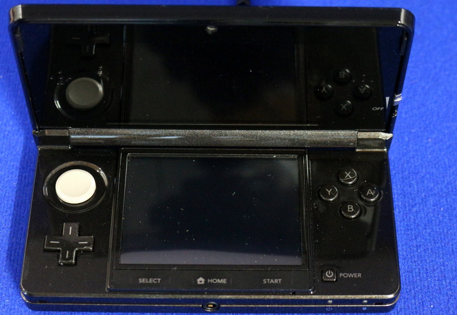 Nintendo 3DS Cosmo Black Console Case, Earbuds, 1 stylus, Charger + 4 Games
