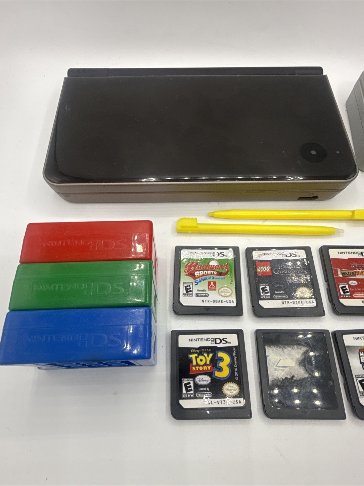 Nintendo DSI XL Handheld Console Bronze UTL-001 Bundle 8 Games, Charger, Stylus