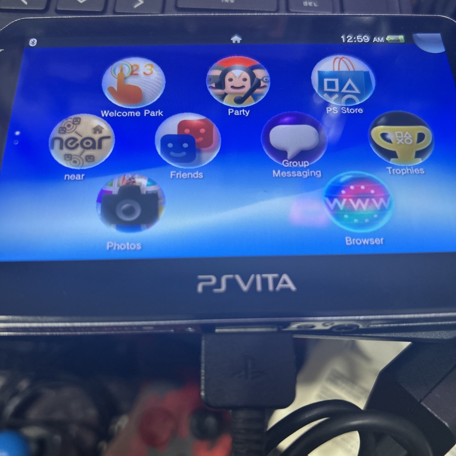 Sony PlayStation Vita PCH-1001 Black With Game And Charger Used.