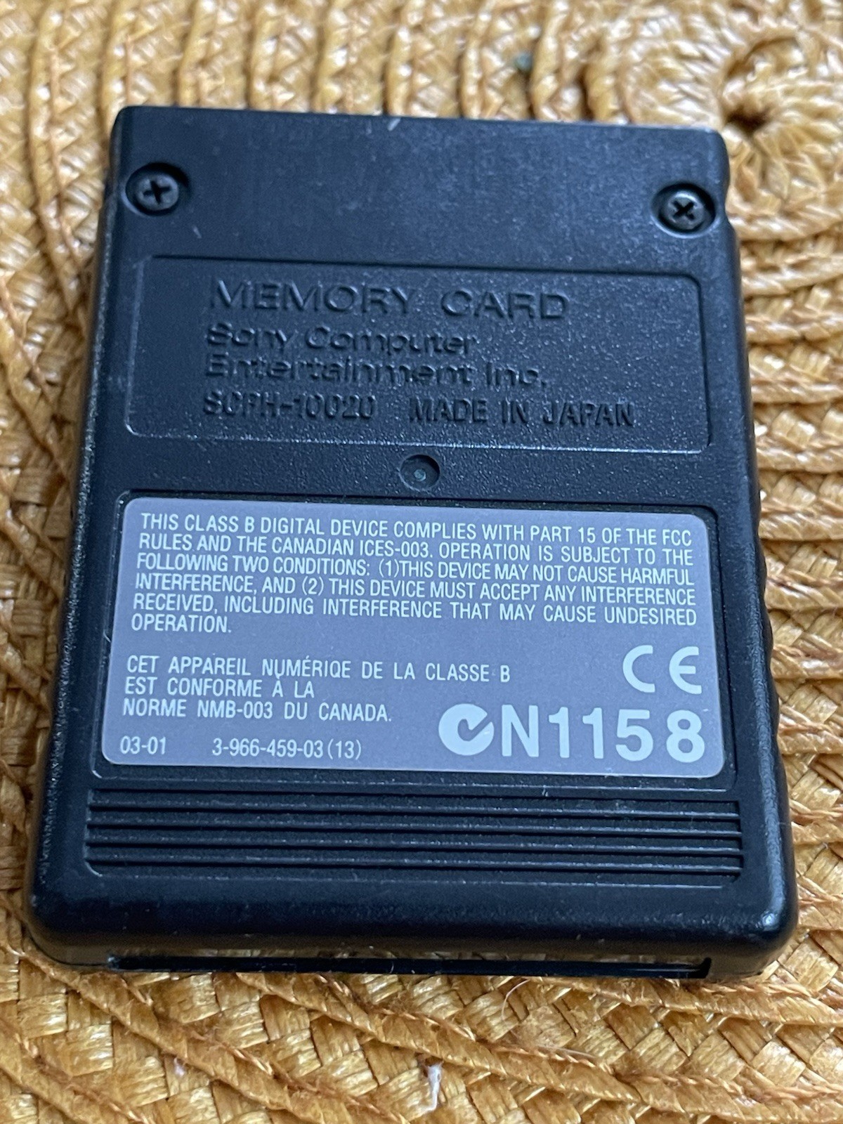 A Logitech PID VV-534 Cordless Action Controller And, A PS-2 8 MB Memory Card
