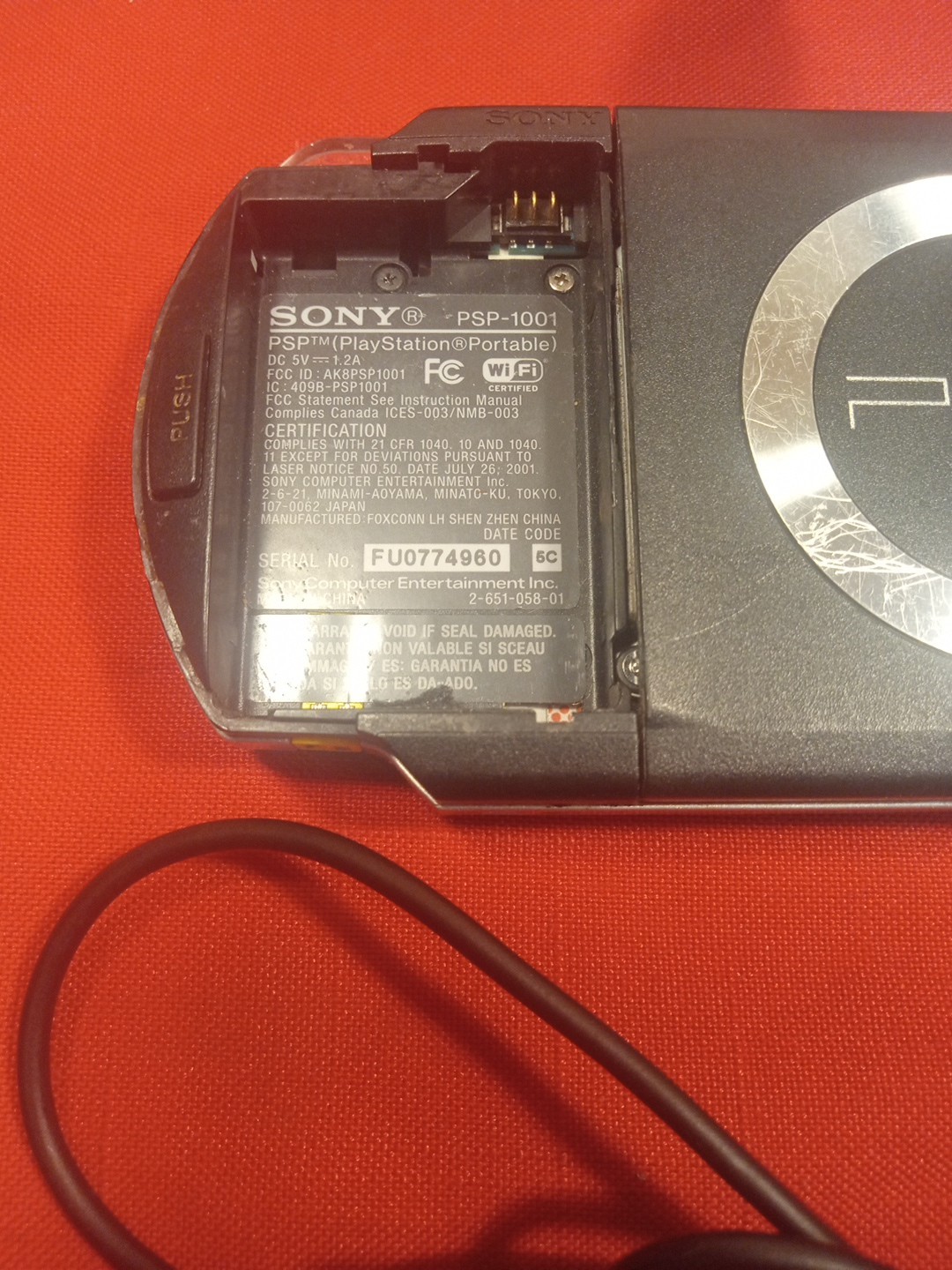 PSP 1001 CONSOLE+AC ADAPTER/NO TOGGLE BUTTON OR BATTERY & COVER/ SEE…