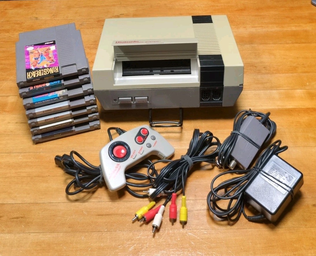 NES NES-001 Console Tested Bundle, OEM Cords Plus 7 Games 1 Controllers