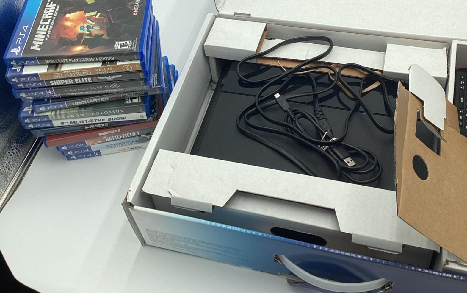 PlayStation 4 And Games Bundle. Does Not Include The PS Plus Membership.