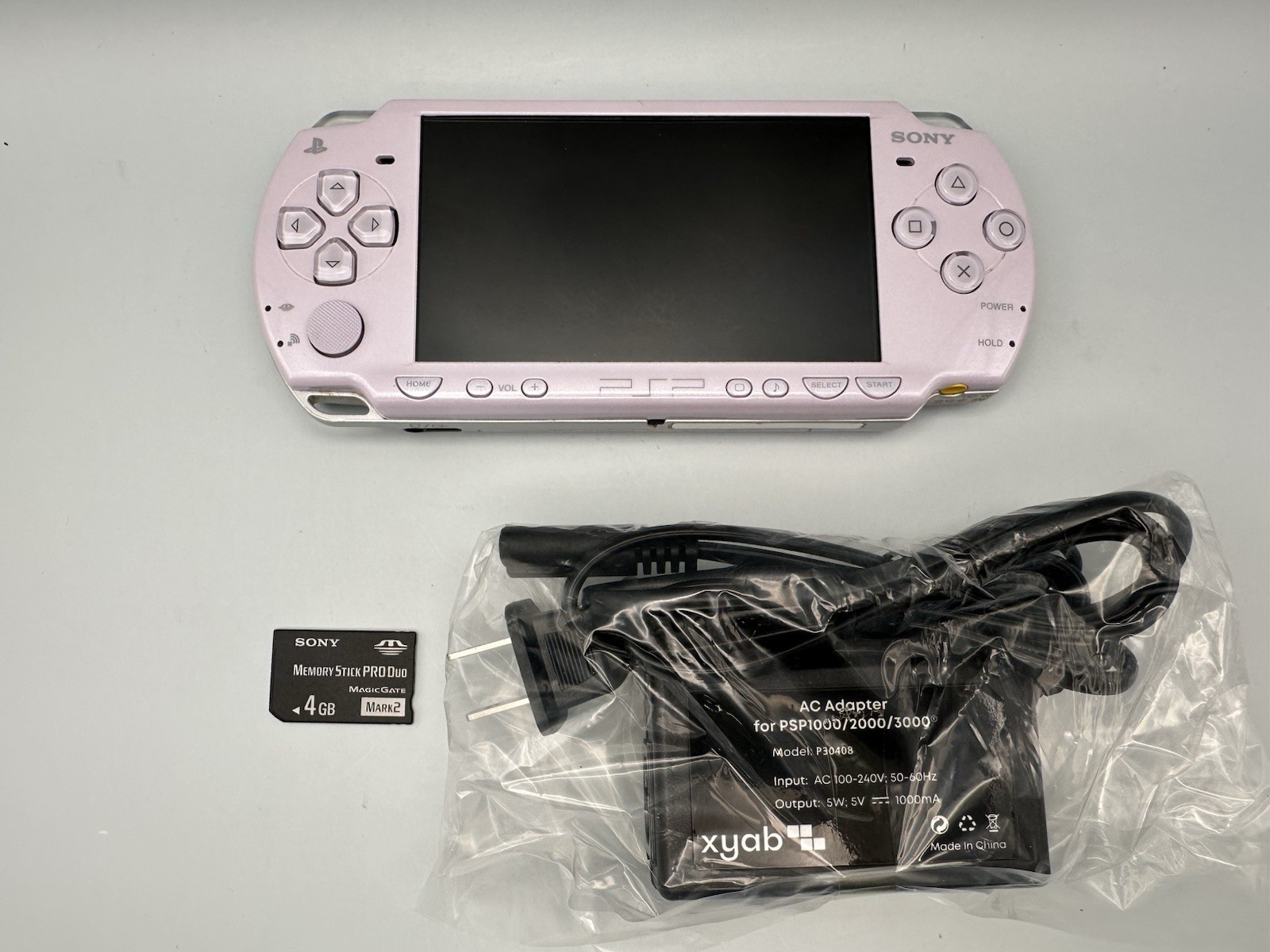 Sony PSP 2000 Console Lavender Purple – New Battery + 4GB Memory Card + Charger