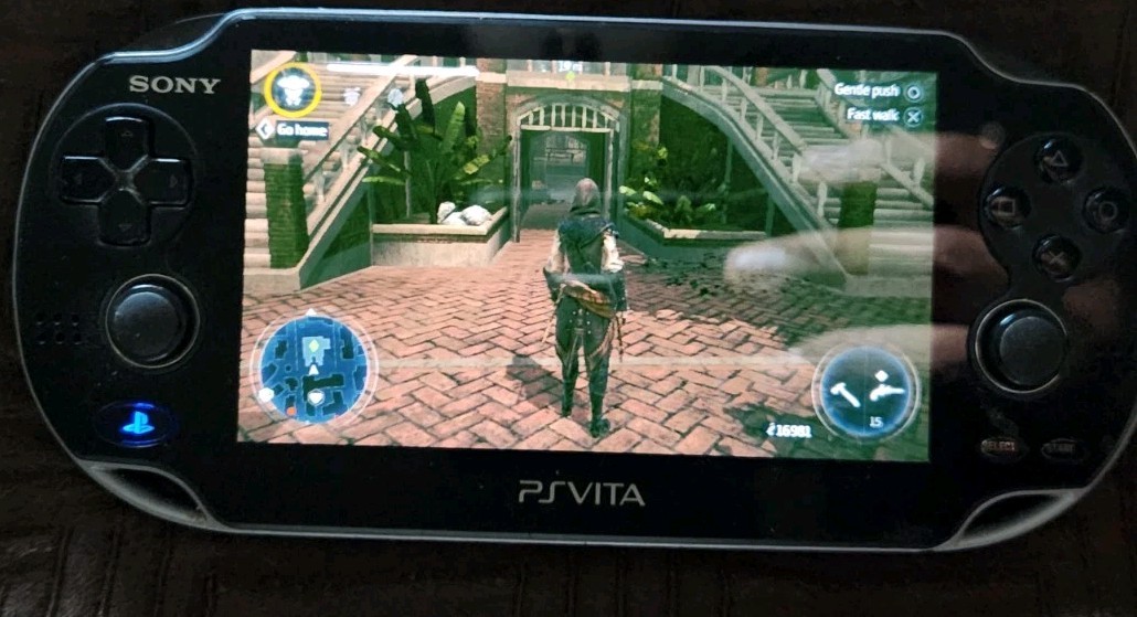 PlayStation PS Vita The Walking Dead Bundle w/64 GB Memory Card, Case, Two Games