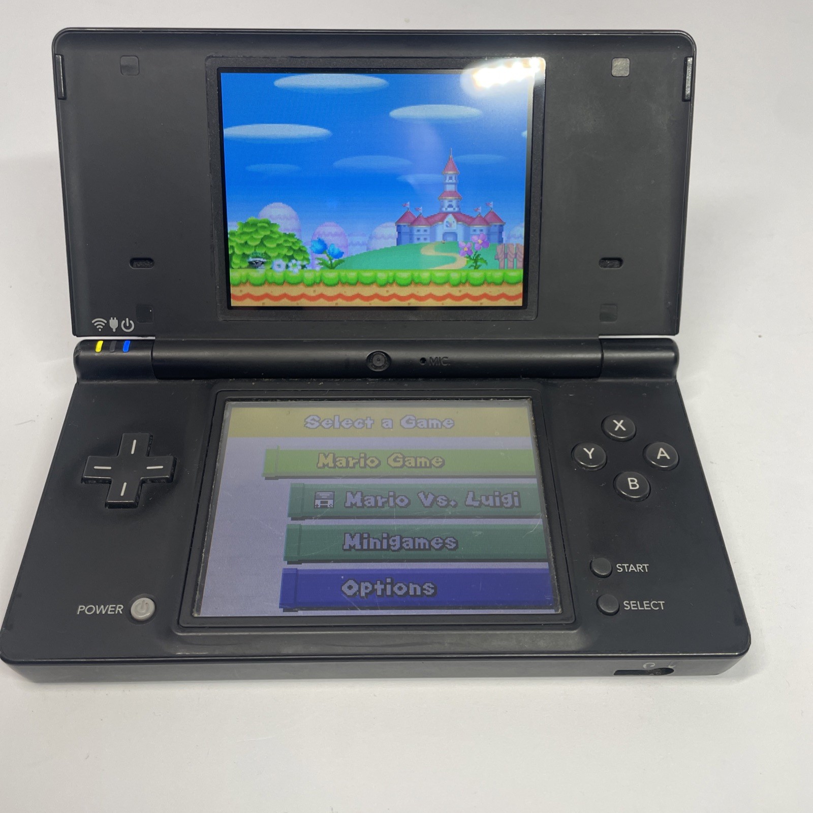 Nintendo DSi TWL-001 Black handheld system w/ Mario Bros -needs charger