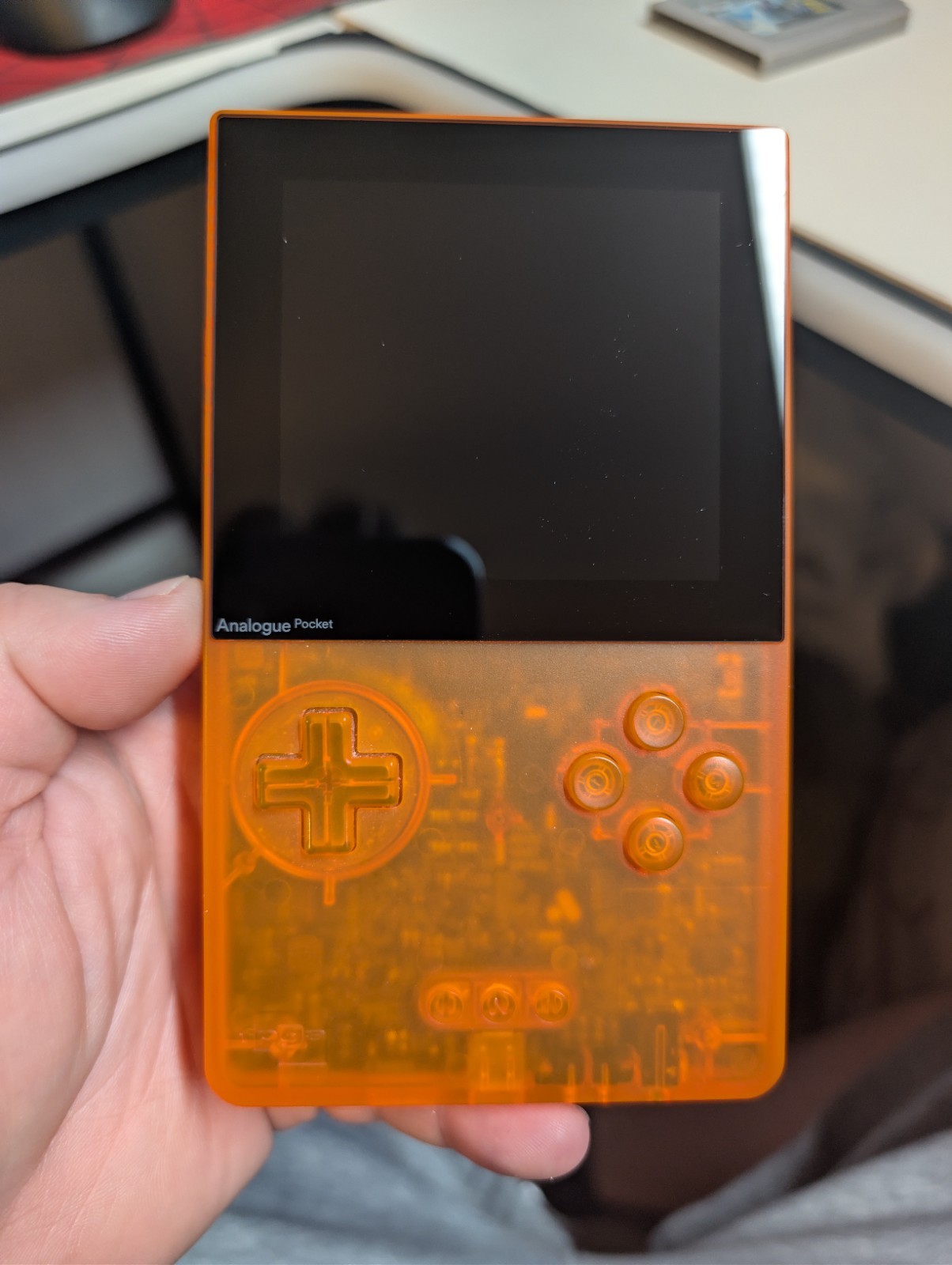 Analogue Pocket Handheld – Transparent Orange Limited Edition w/ pokemon silver